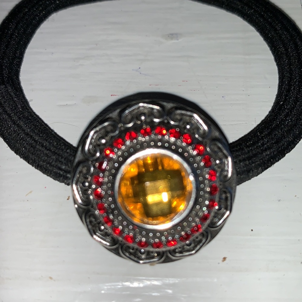 Black stretch bracelet with one snap.  NWOT